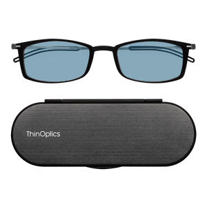 ThinOptics Reading Glasses with Blue Light Blockers and a sleek black case: minimalist design with thin lenses. The compact, brushed metal case offers a modern, portable solution for individuals needing reading glasses.