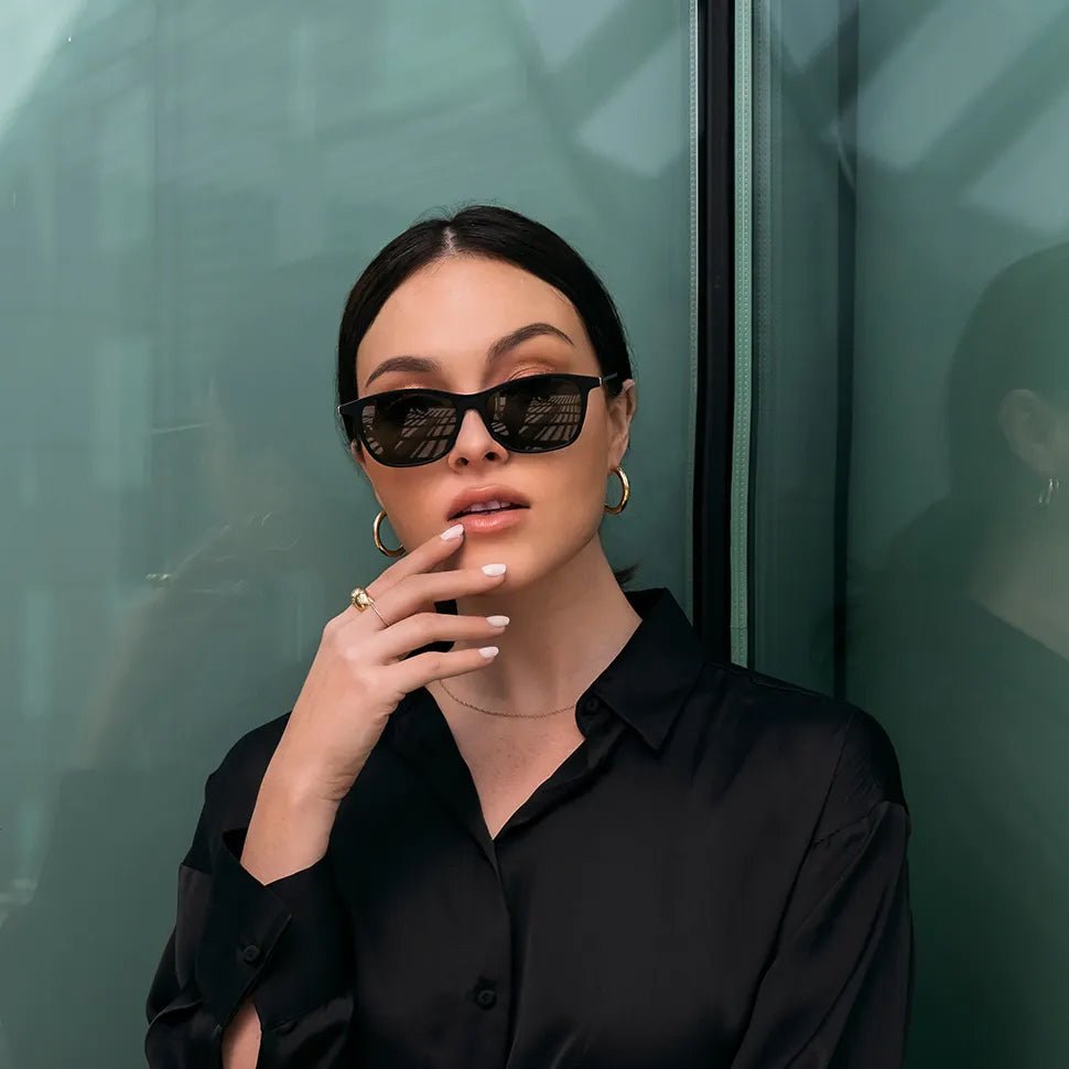 Women is wearing ThinOptics Sunglasses